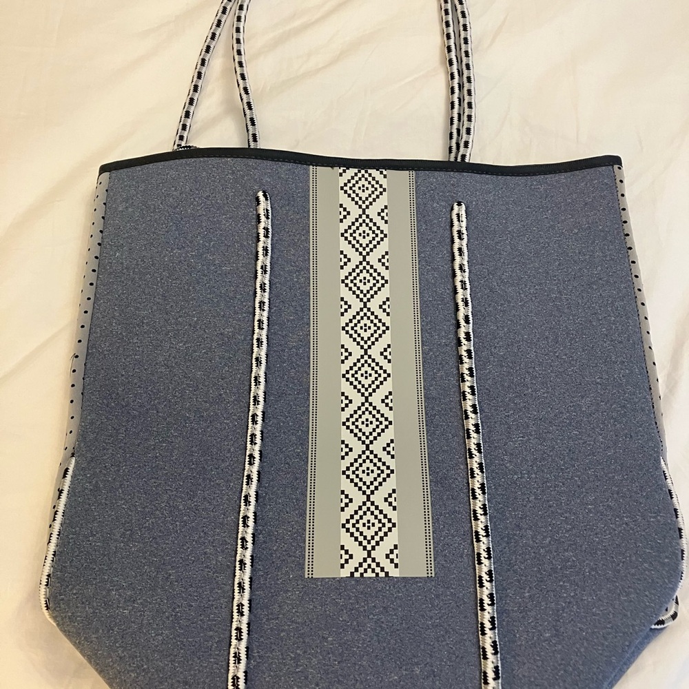 Denim Colored Tote Bag. Includes matching attachable small case.